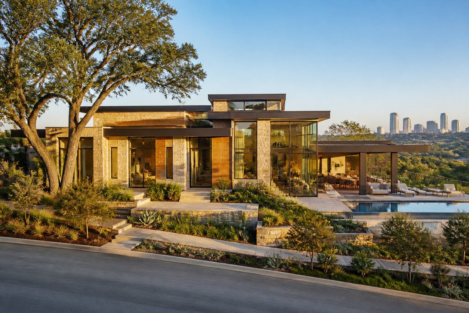 An upscale modern home with a pool and landscaped yard beneath live oak trees in Austin, Texas.