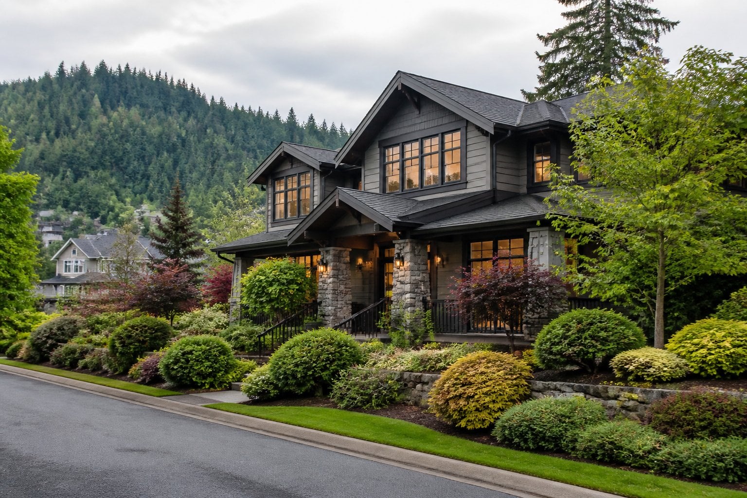 An upscale craftsman-style home on a lush, tree-lined residential street in Portland, Oregon.